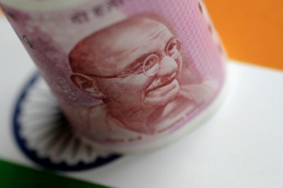 Indian Rupee Sinks to Record Low as Hawkish Fed, Russia Tensions Weigh